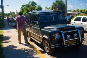 Land Rover Defender taxi.