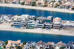 Dubai's The Palm Jumeirah artificial island with beachfront and luxury villas.
