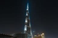 Burj Khalifa, shining against the night sky.