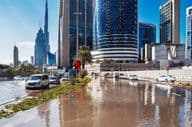 Dubai, heavy rain and flooded street.