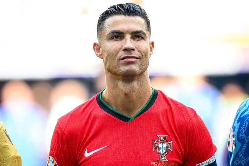 Cristiano Ronaldo in red soccer jersey.