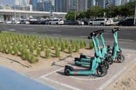 Parking lot of electric scooters in Dubai.
