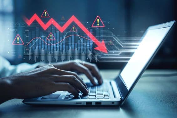 Market graph, alert symbols, and negative data trends.