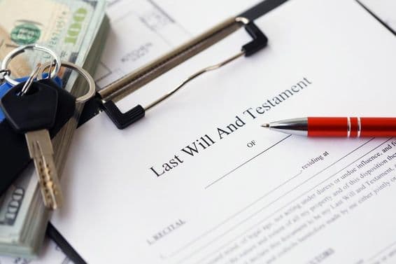 Pen and keys on a will form.