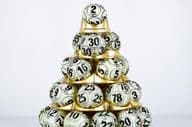 Lottery balls stacked in a pyramid.