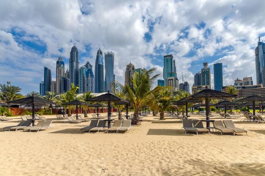 Jumeirah Beach overlooking the Dubai Marina skyline.