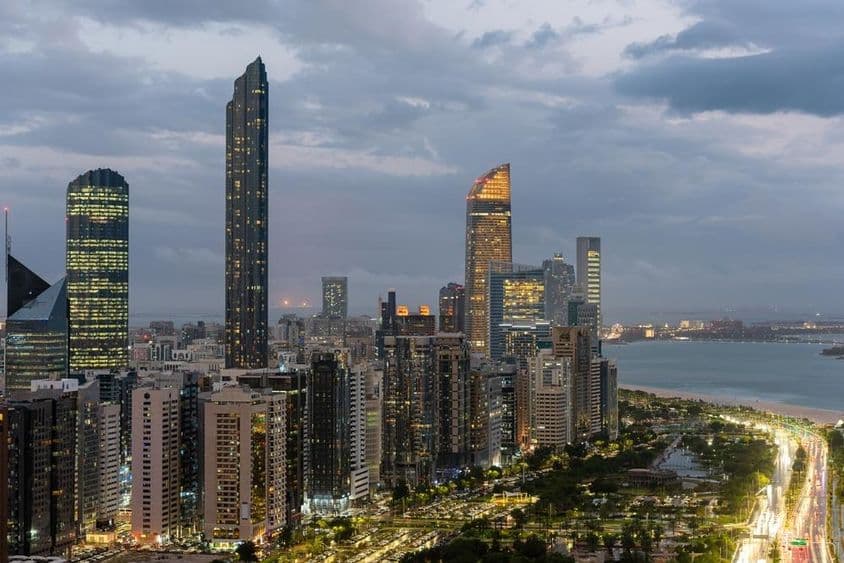 Abu Dhabi skyline on a cloudy day.