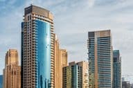Residential buildings and hotels in skyscrapers around Dubai Marina.