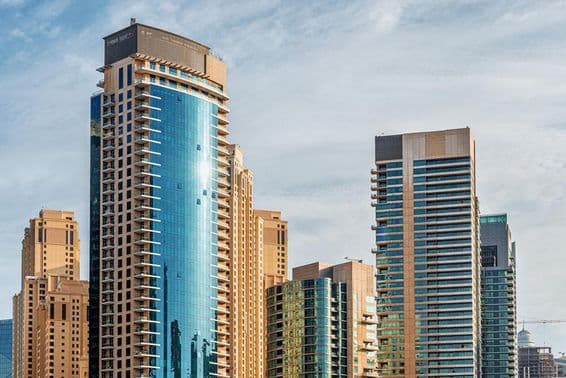 Residential buildings and hotels in skyscrapers around Dubai Marina.