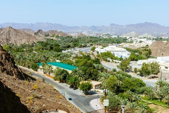 A beautiful view overlooking the Hatta Dam or the Lake and the Hajar Mountains in the Dubai Emirate.