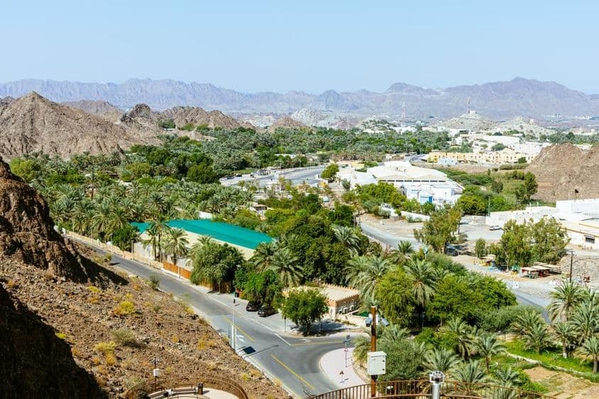A beautiful view overlooking the Hatta Dam or the Lake and the Hajar Mountains in the Dubai Emirate.