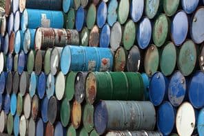 Oil barrels stacked on top of each other.