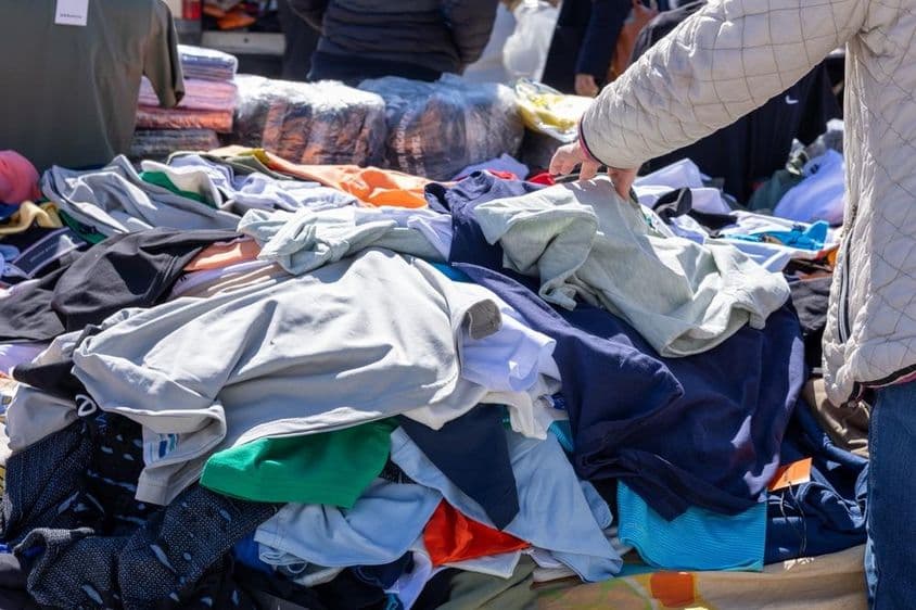 Various counterfeit designer clothing items.