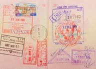 Passport with stamps from Thailand, Hong Kong, and Lebanon.