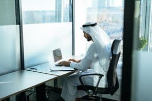 A man working in a Dubai business office.