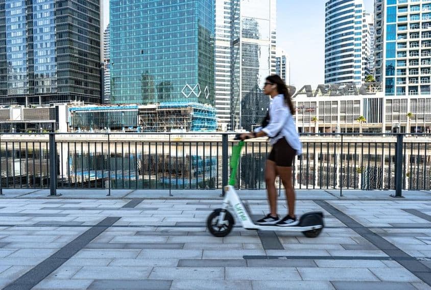 An electric scooter on the Dubai Marina promenade.