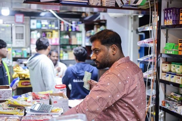 People shopping at a local market in Dubai.
