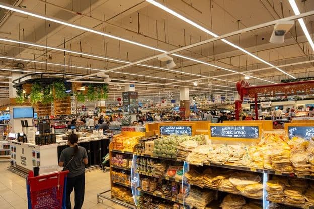 People in Carrefour supermarket at Dubai Mall of Emirates.