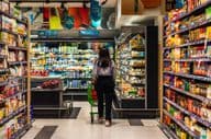 A young woman shopping at Lulu supermarket.