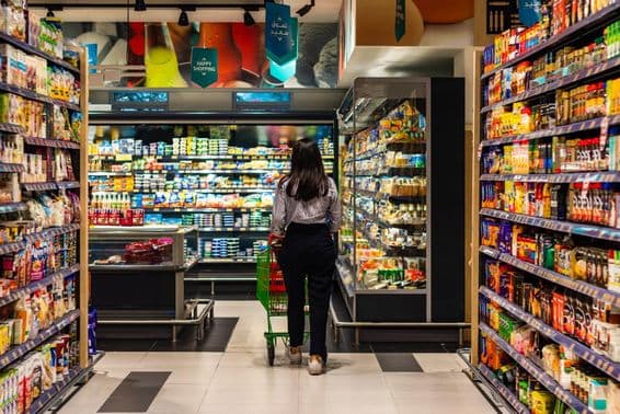 A young woman shopping at Lulu supermarket.