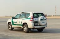 Dubai police car on concrete.