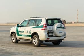 Dubai police car on concrete.