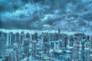 Rain in Dubai through a window.