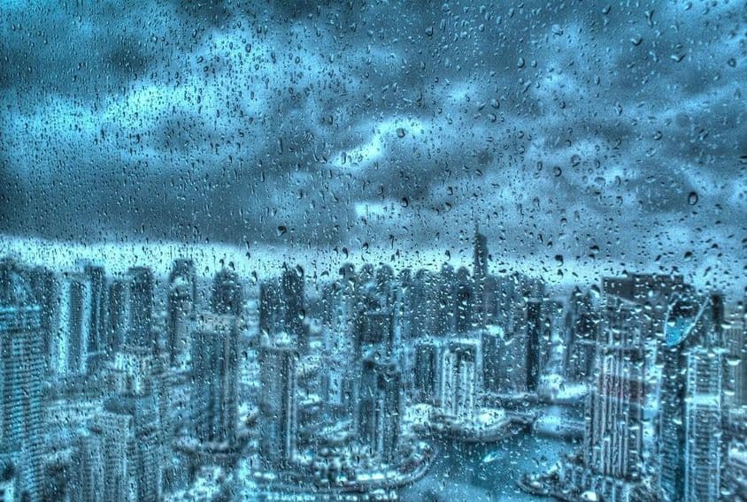 Rain in Dubai through a window.