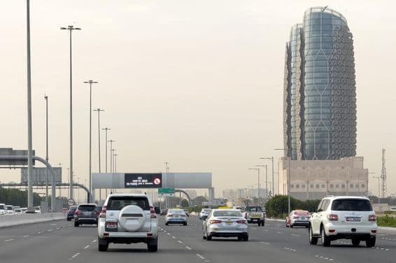 A busy Al Salam Street in Abu Dhabi with vehicles