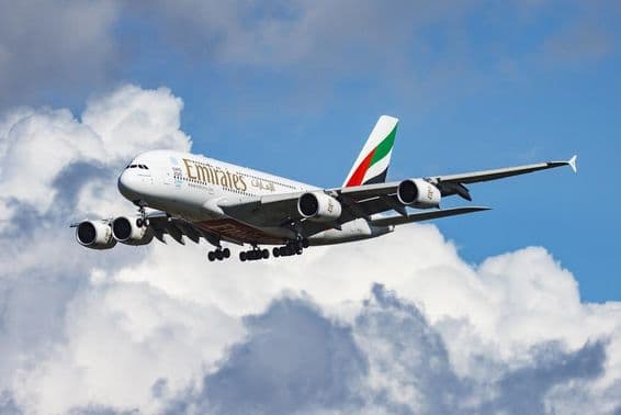 Emirates passenger plane landing.