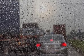 Rain seen through a car window.
