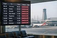 Cancelled flights on a board.