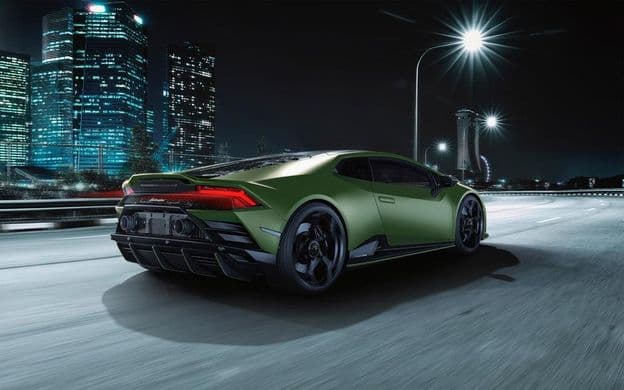 A matte dark green Lamborghini Huracan