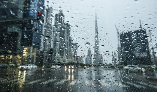 Rain in Dubai, with skyscrapers in the background
