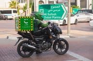 Motorcyclist from Careem's eco-friendly green delivery service.