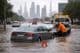 Car on flooded Dubai street