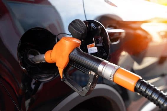 Car being refueled with petrol