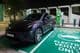 Electric car charging station with power cable at ENOC petrol station