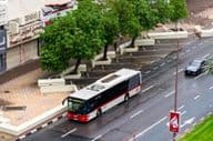 view of a bus on the road in Dubai City.