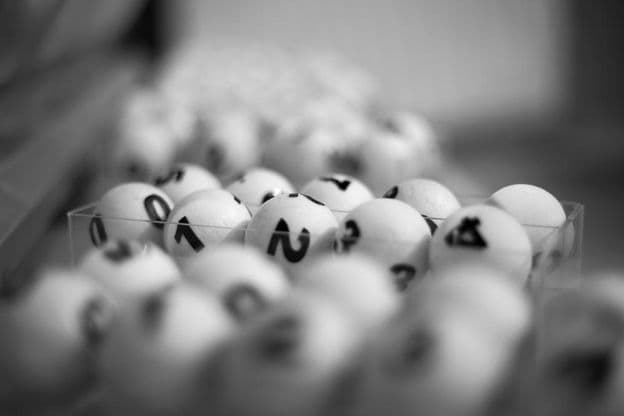 white balls with numbers for lottery game