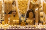 Image of women's jewelry in a display at the Dubai Gold Souk market.