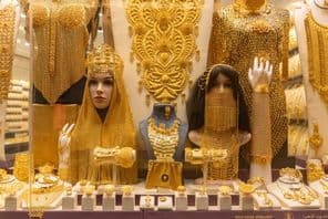 Image of women's jewelry in a display at the Dubai Gold Souk market.