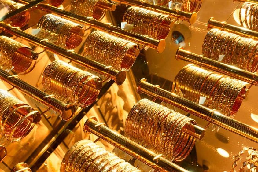 Gold bracelets in a jewelry store at the Dubai Golden Souk market