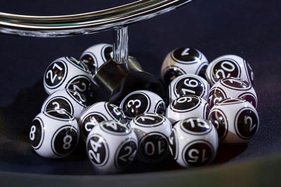 Black and white lottery balls