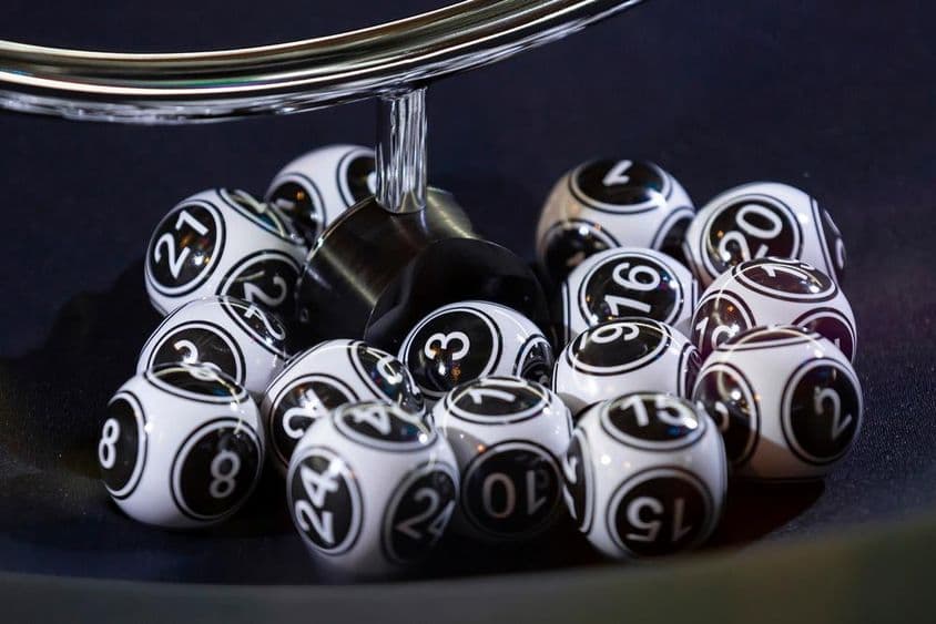Black and white lottery balls