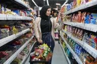 A young Arab woman in a supermarket