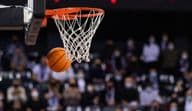 Basketball game with a hoop.