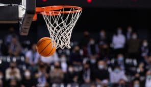 Basketball game with a hoop.