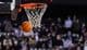 Basketball game with a hoop.