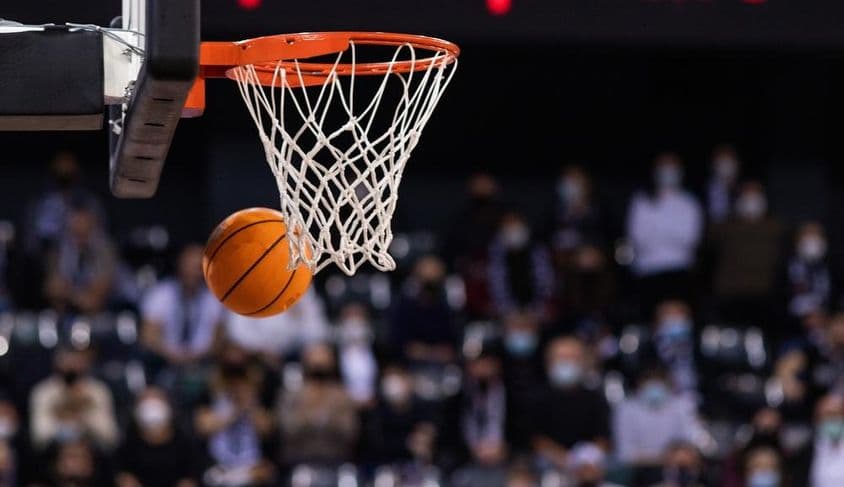 Basketball game with a hoop.